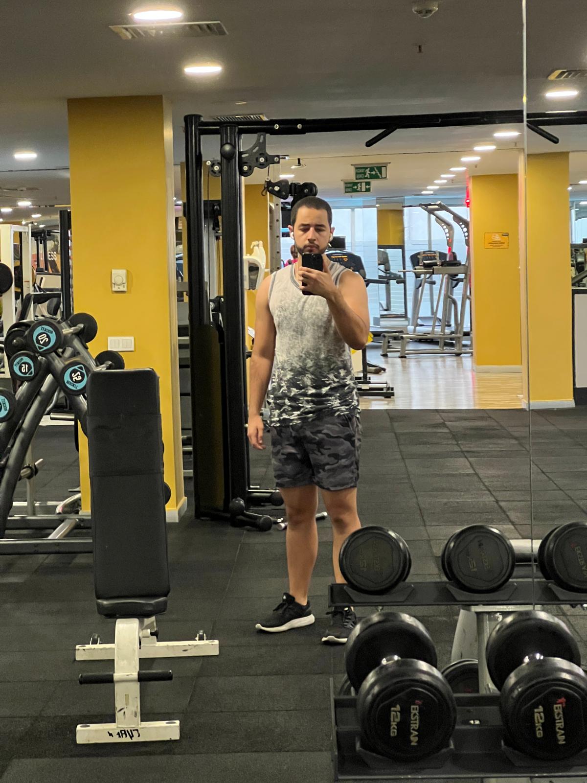 Arda Orak in fitness studio working out, 2023