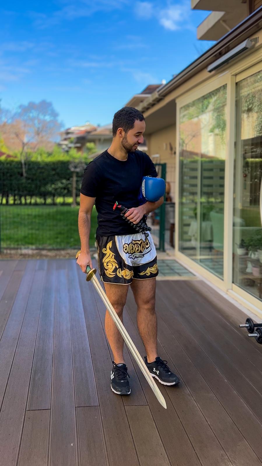 Arda Orak with his sword, practicing hyrid workout and Muay Thai with his friend, 2024