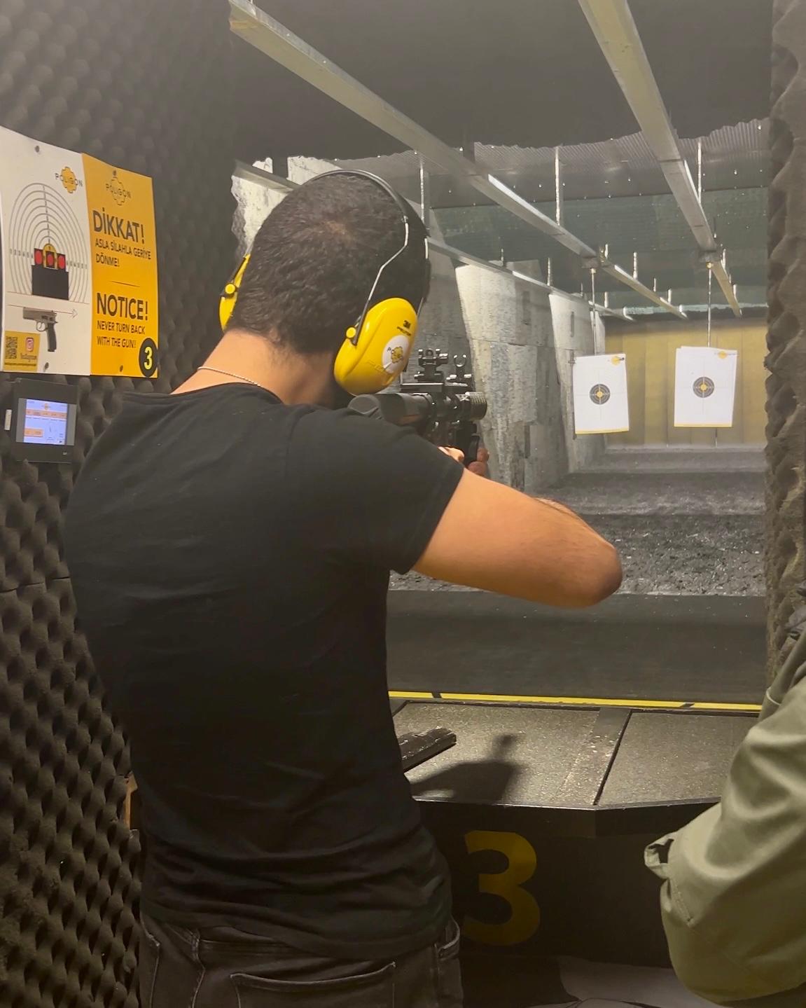 Arda Orak at the shooting range, using long range rifle, 2023